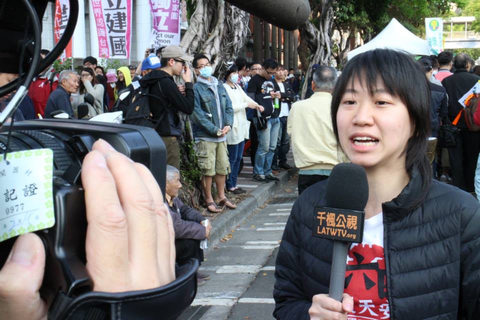 Sally Tang of Socialist Action (CWI/ISA in Hong Kong) speaking to local media from Taipei Sunflower Movement, 22 March 2014. 